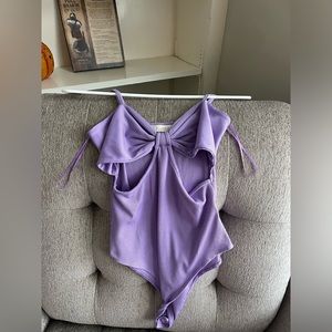 purple cut-out body suit